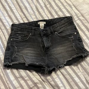 H&M women’s black jean distressed shorts. Size US 4